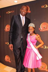 Miss Georgia Pre-Teen Damacia Howard and Dikembe Mutombo